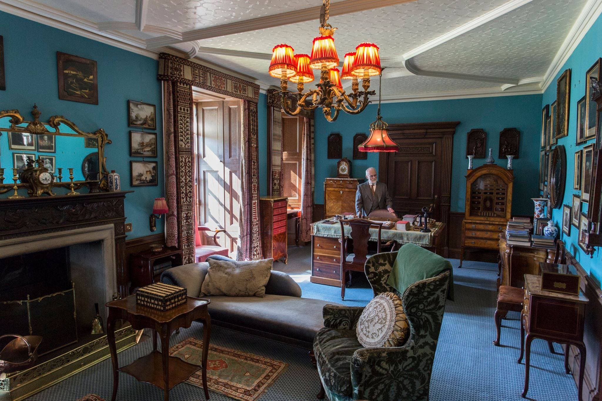 Man standing in impressive room in Lauriston Castle