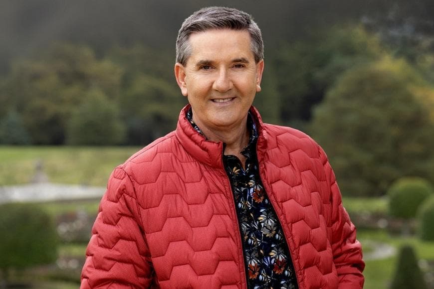 Photograph of Daniel O'Donnell in a red jacket