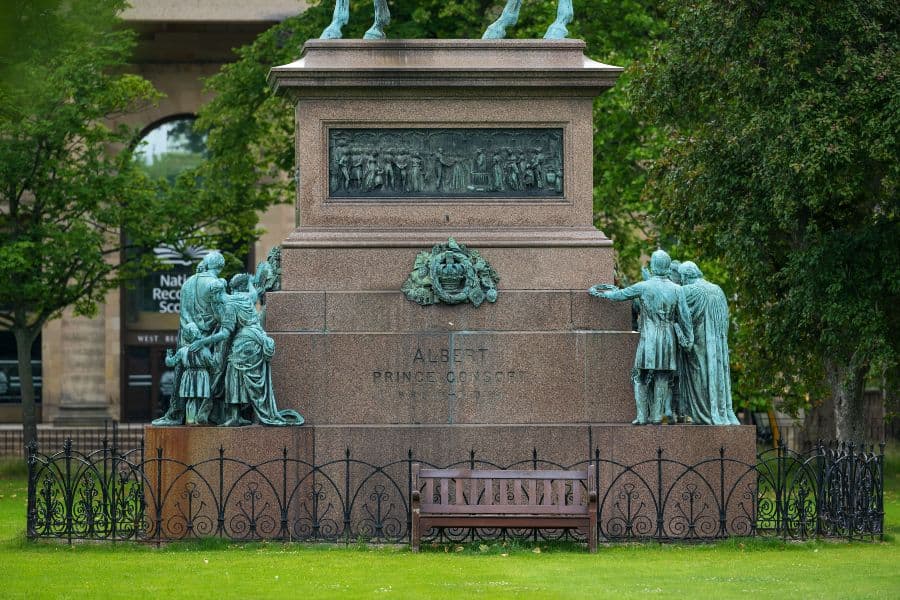 Green statuettes at the bottom of a Prince Albert memorial