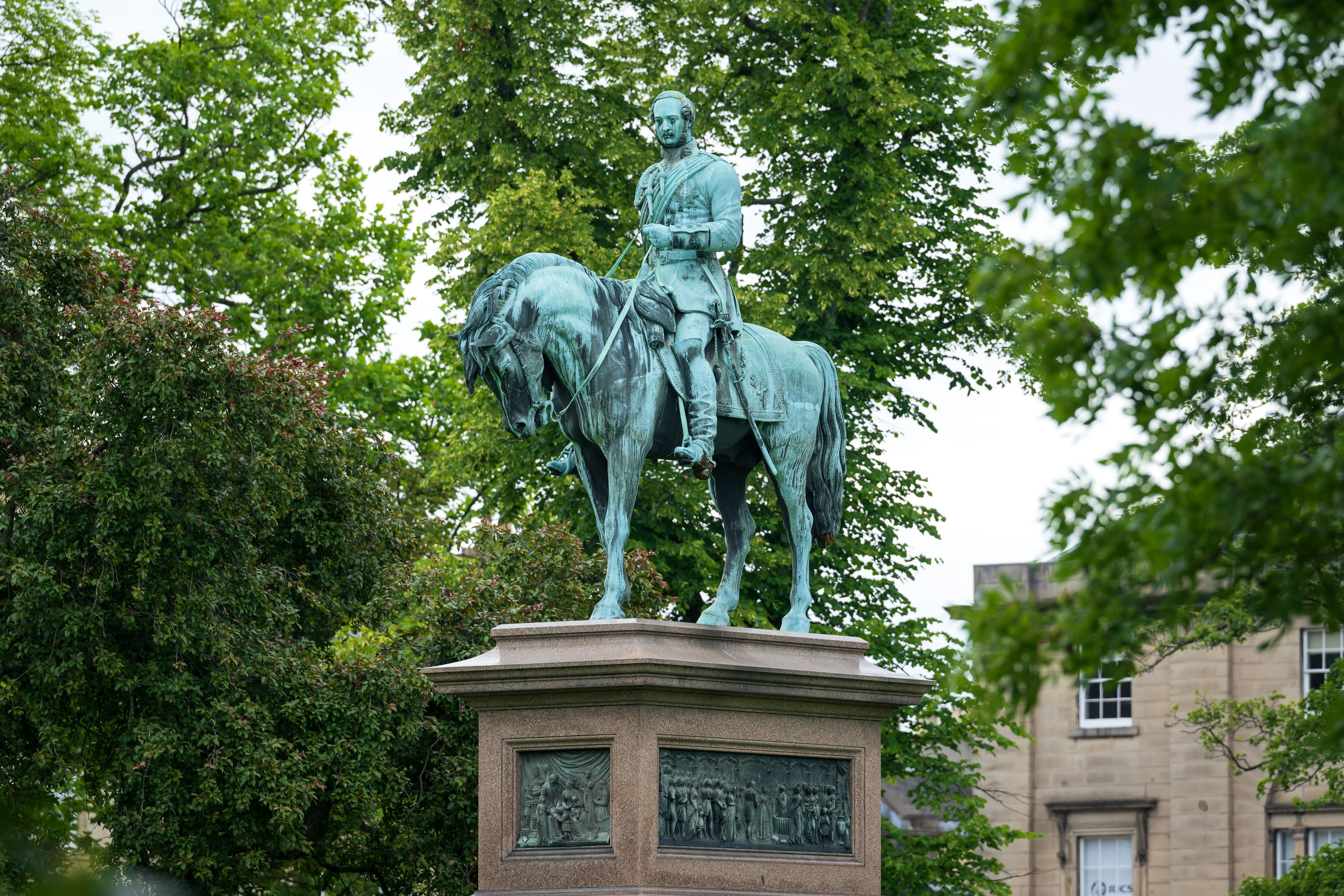 Statue of Prince Albert surrounded by trees