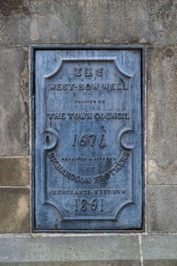 Plaque on the side of Bow Well