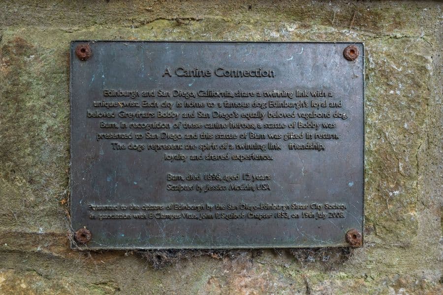Plaque reading 'a canine connection'