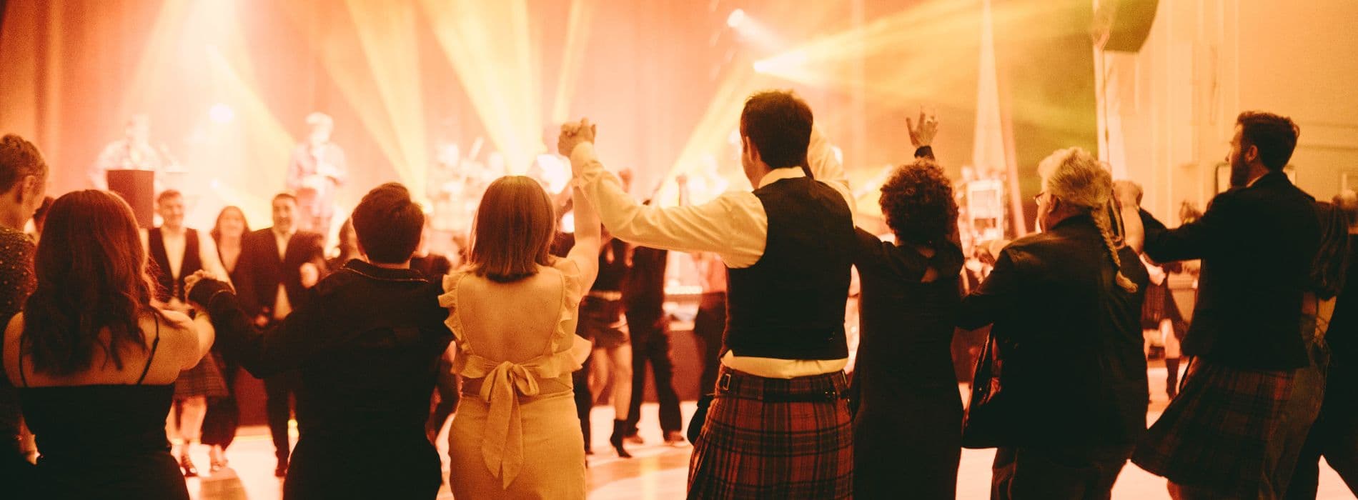 People dancing traditional Scottish dances