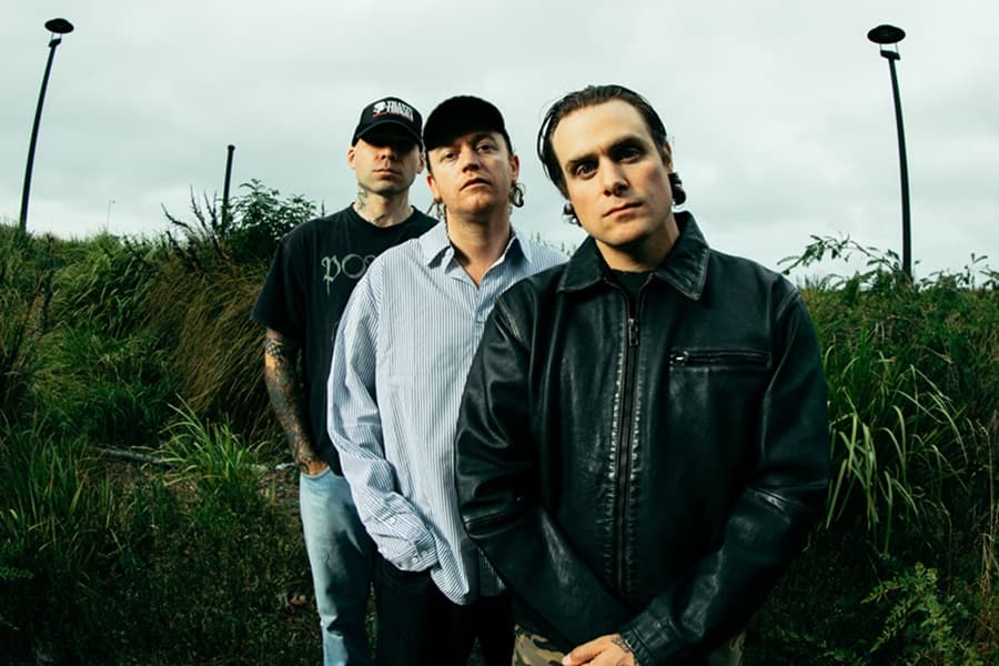 Image shows members of DMA's standing on a hill