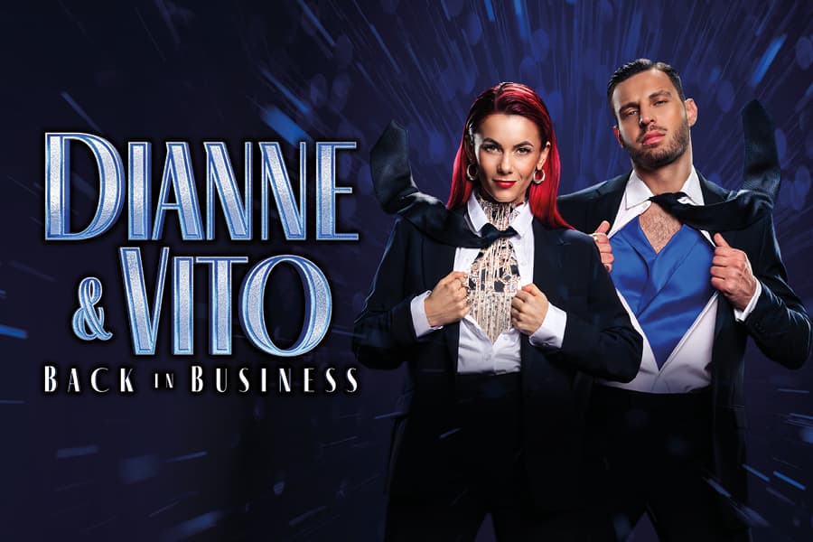 Image shows Dianne and Vito wearing suits