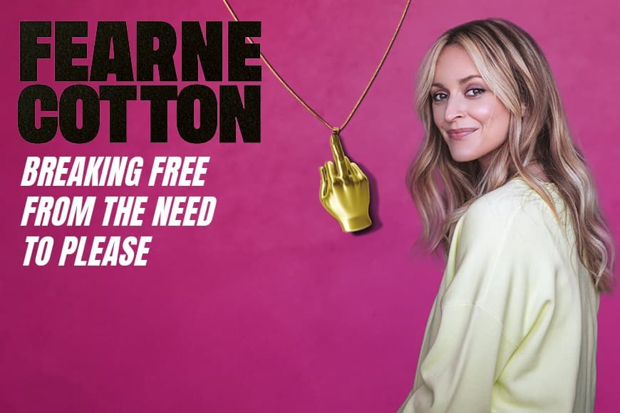 Fearne Cotton Smiling alongside a gold necklace that has pendant in the shape of a hand giving the middle finger - breaking free from the need to please