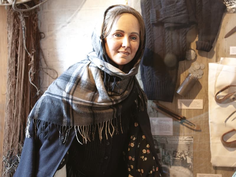 A mannequin dressed as an Edinburgh fisherwoman on display at The People's Story Museum on the historic Royal Mile. 