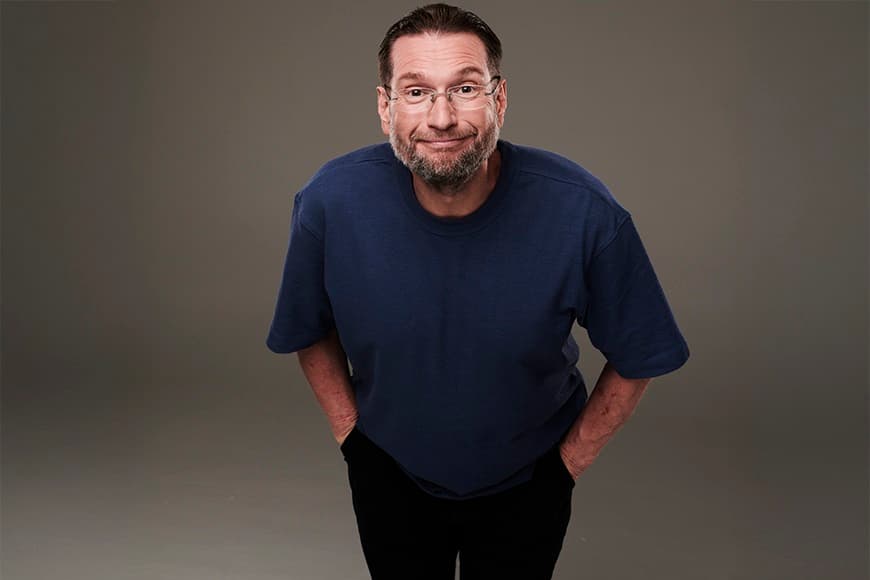 Image of Gary Delaney looking down camera