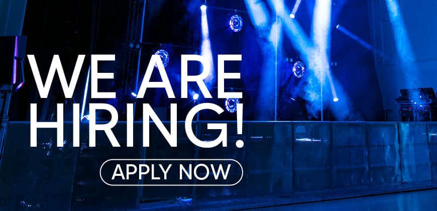 Assembly Rooms stage lit with blue light.