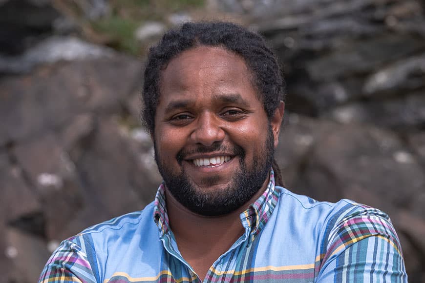 Image of Hamza Yassin smiling