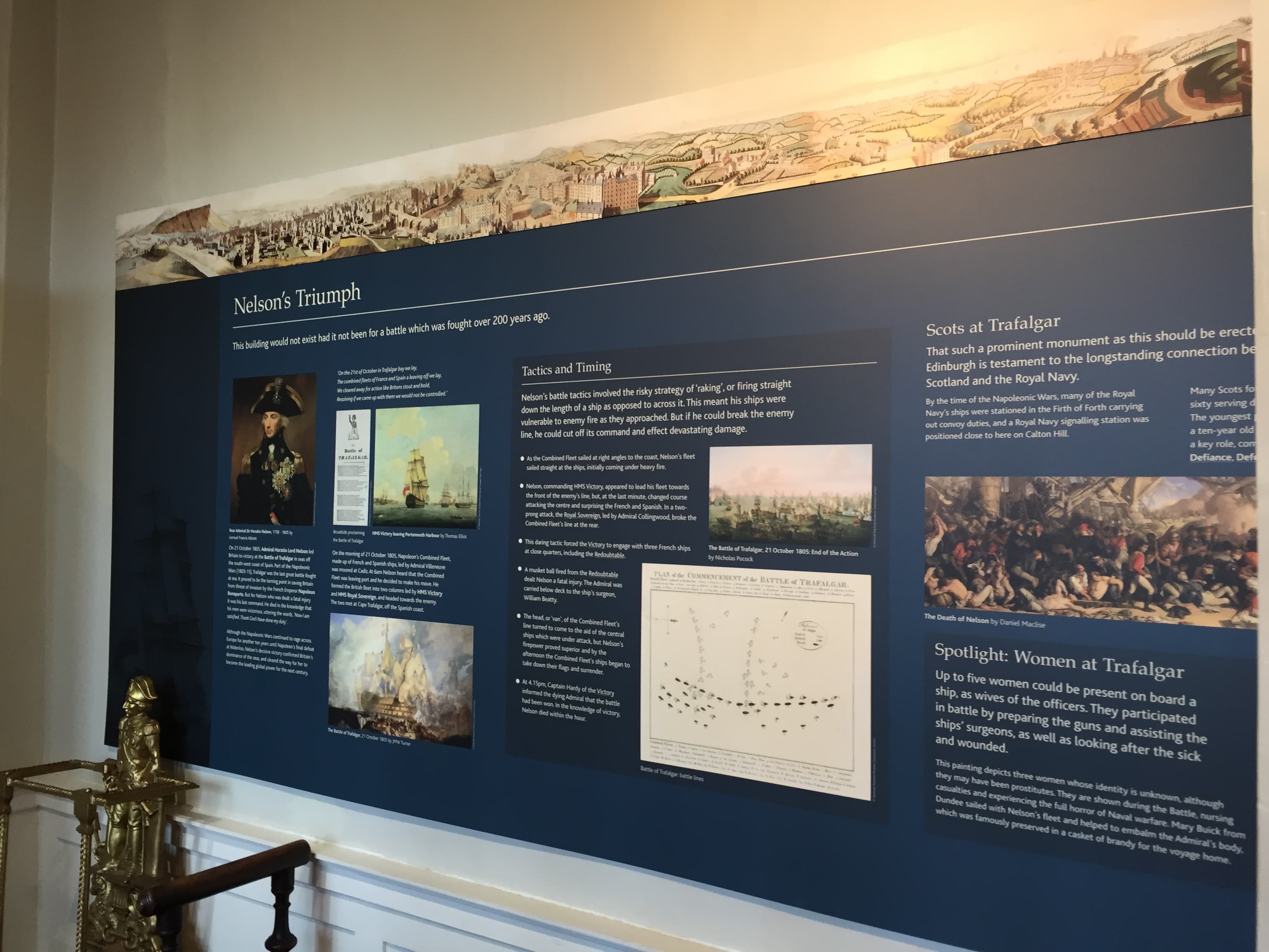 An extensive exhibit showcasing significant battles of the British Navy with informative text and visuals.