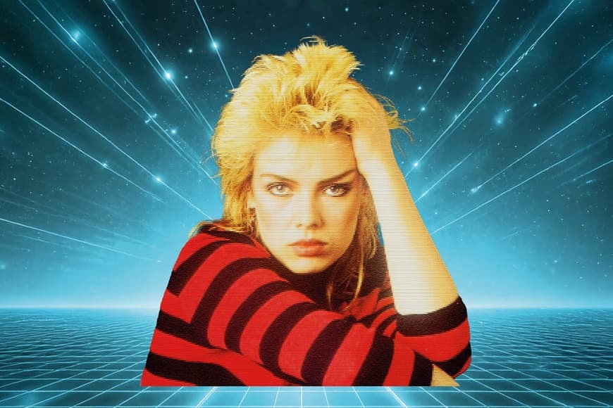 Image of Kim Wilde with hand on head
