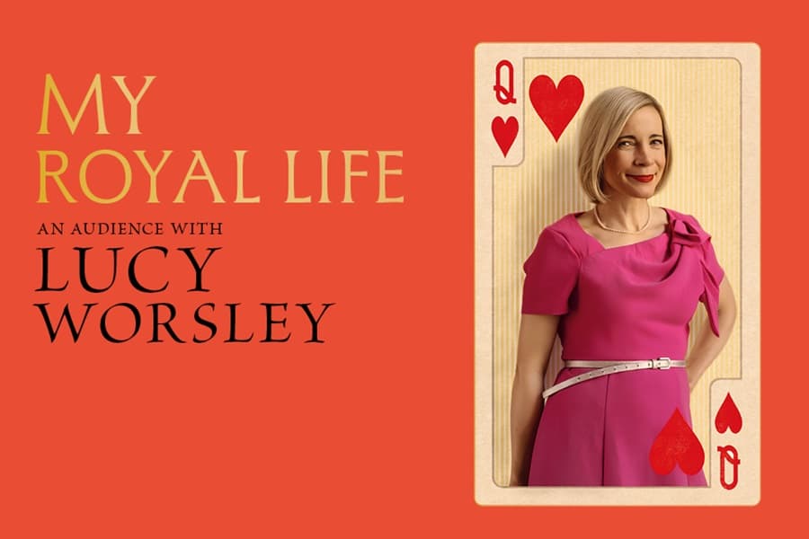 Image shows Lucy Worsley smiling in pink dress