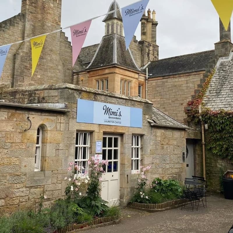 The courtyard and entrance to Mimi's Little Bakehouse at Lauriston Castle in Edinburgh.