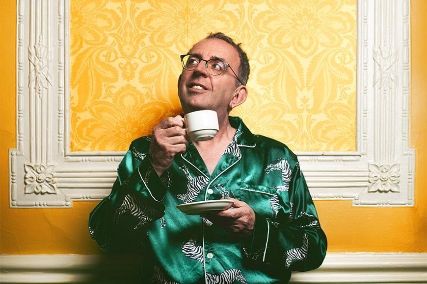 Reverend Richard Coles drinking a cup of tea