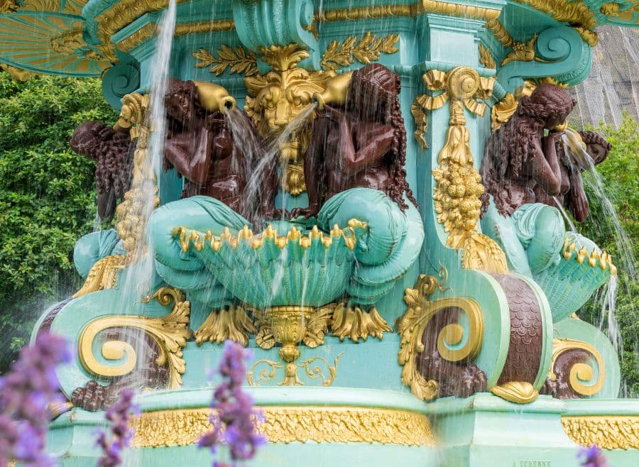 Close up of the Ross fountain statuettes spouting water