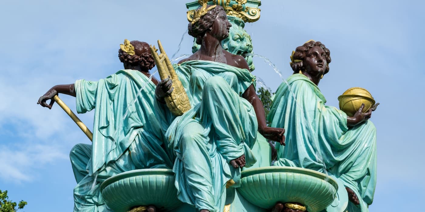 Close up image of angelic looking statuettes on the Ross Fountain