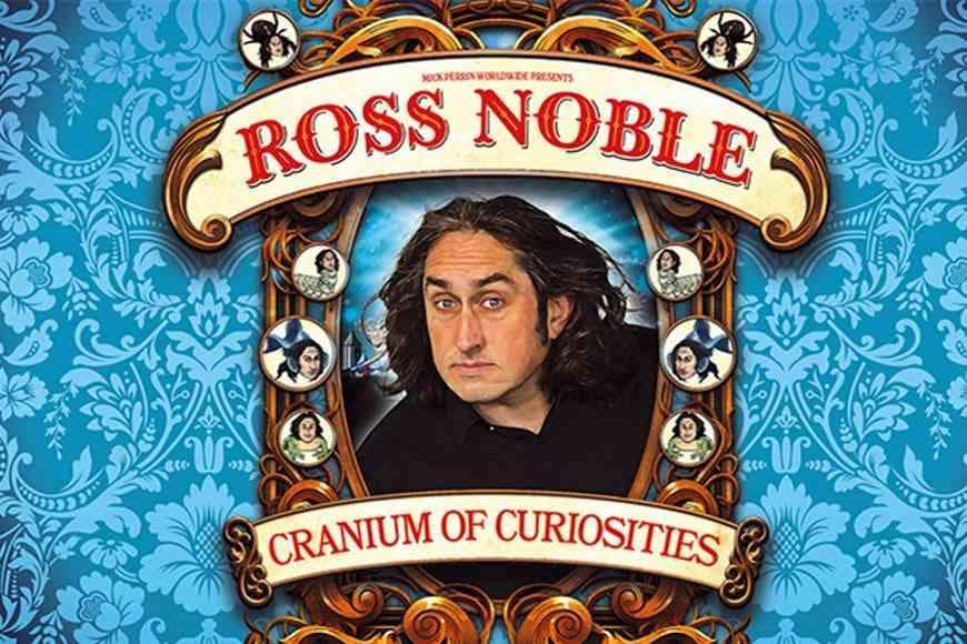 Ross Noble peering through picture frame