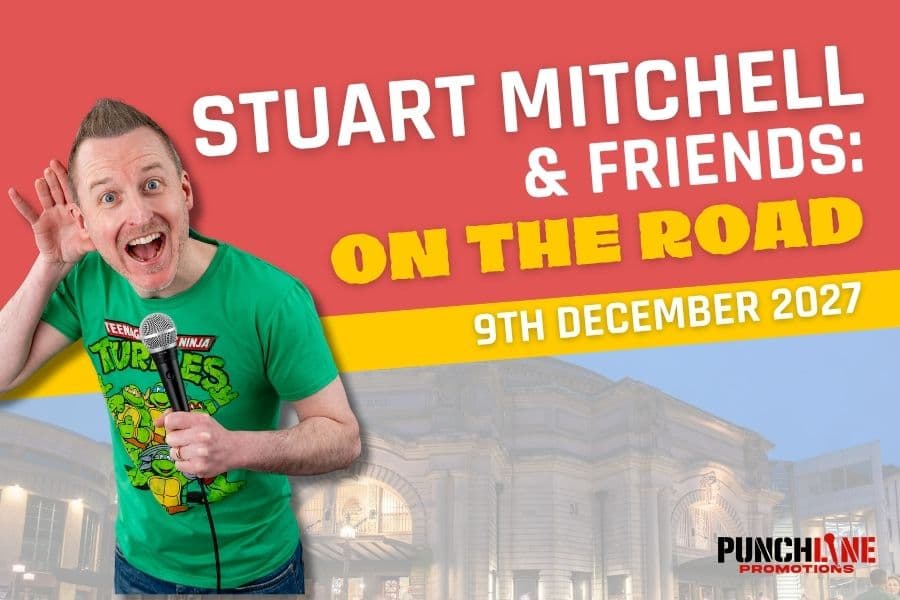 Comedian, Stuart Mitchell, wearing a green T-shirt standing in front of a photograph of the Usher Hall.