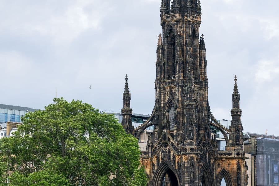 Tall gothic monument surrounded by trees