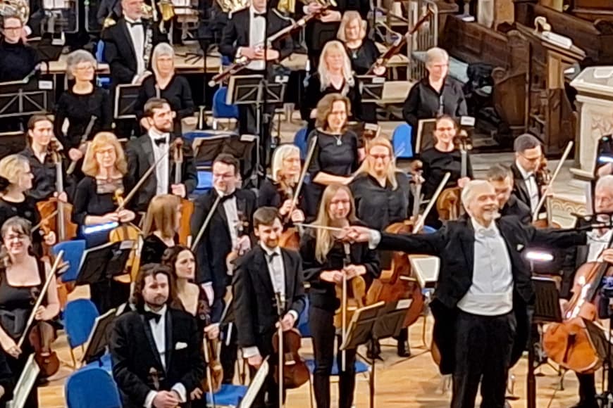 Photograph of players on stage