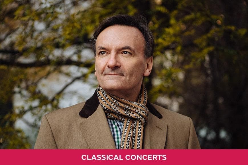 Image of Sir Stephen Hough wearing brown coat
