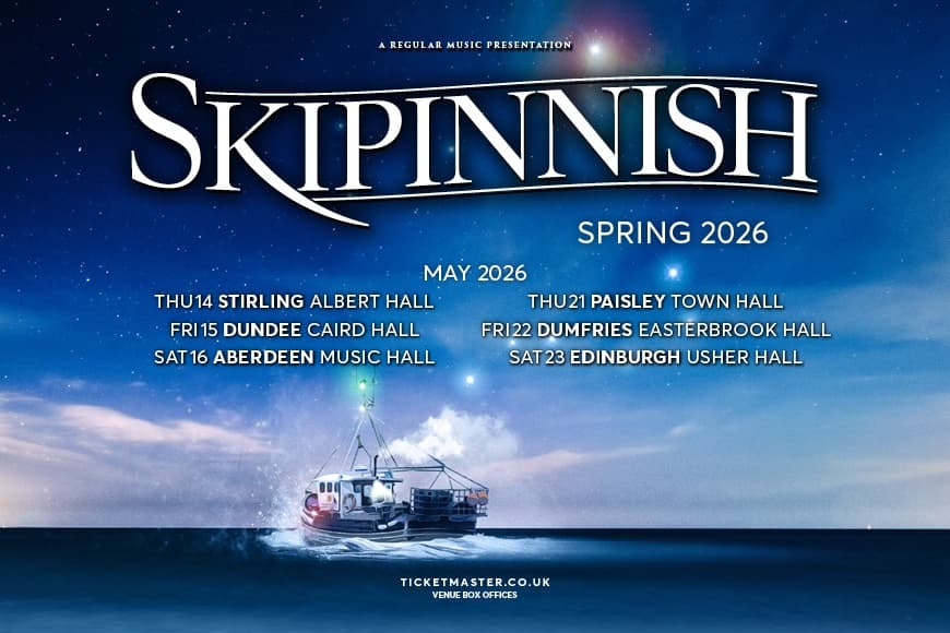 Image of boat in ocean at dusk