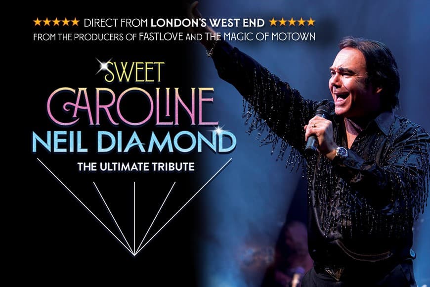 Image shows man dressed as Neil Diamond singing into microphone