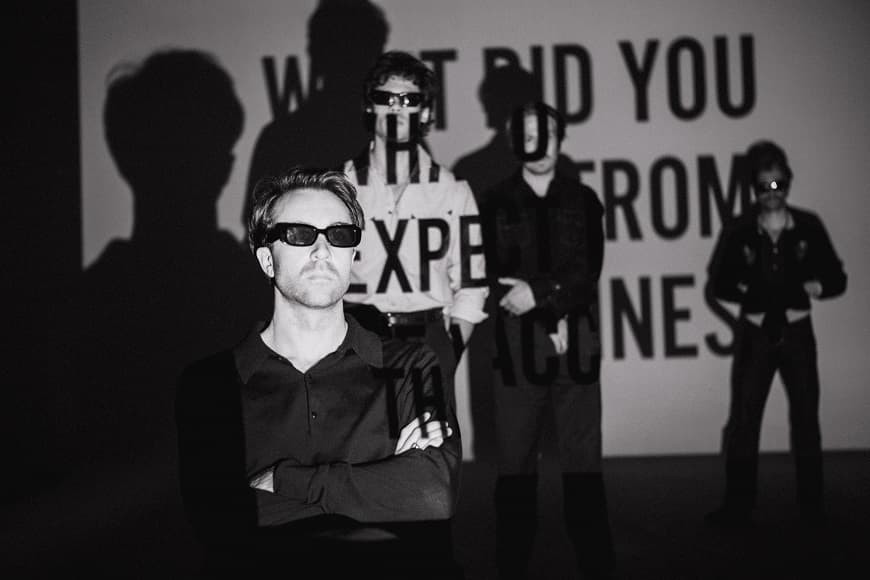 Black and white image of The Vaccines band