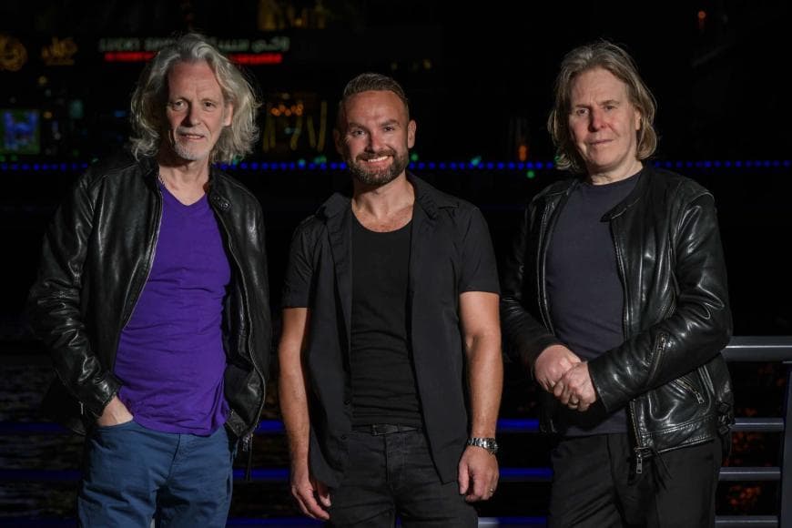 Band members of WET WET WET smiling 