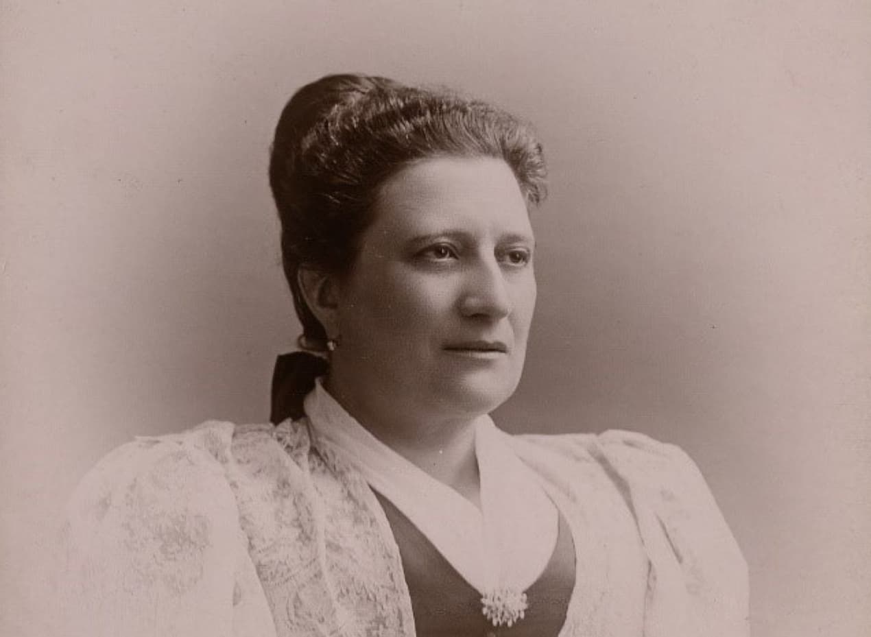 Sepia photo of Castle owner Mrs Reid in Edwardian dress, 