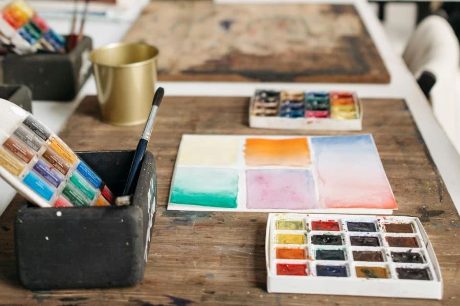 Table full of art supplies 