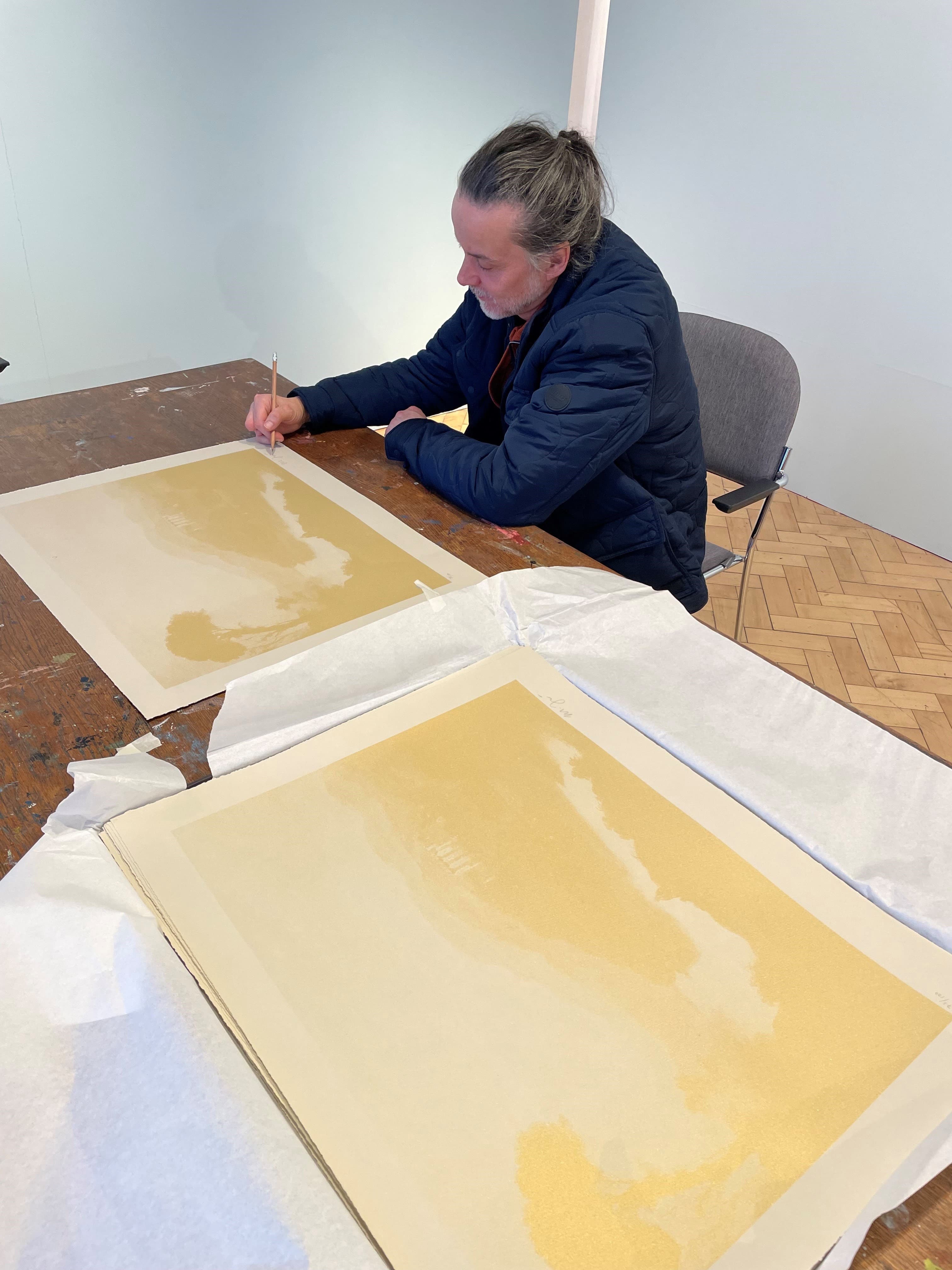 Contemporary Scottish artist, Michael Fullerton, signs new screen-prints in Edinburgh's City Art Centre