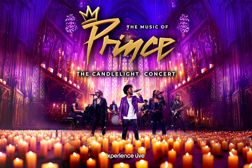 Image of singer dressed as Prince on stage with candles