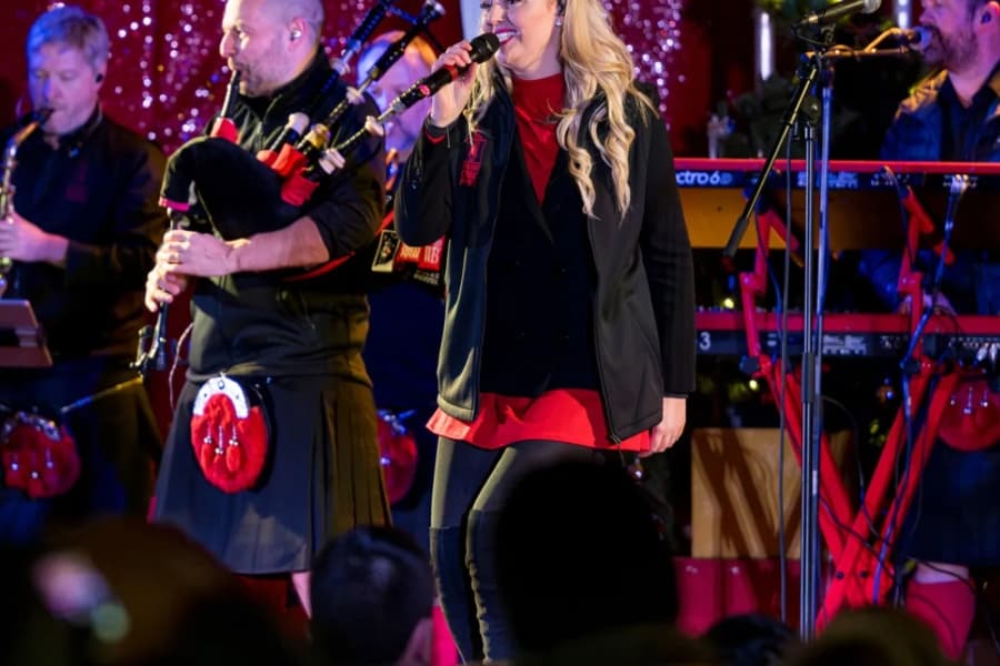 The Red Hot Chilli Peppers performing with a blonde front woman singing