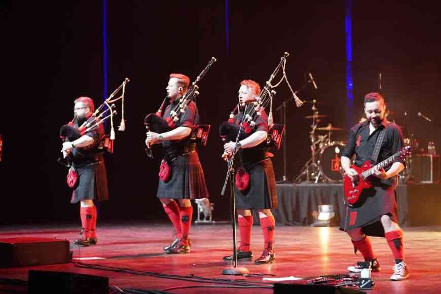 Red Hot Chilli pipers performing on stage