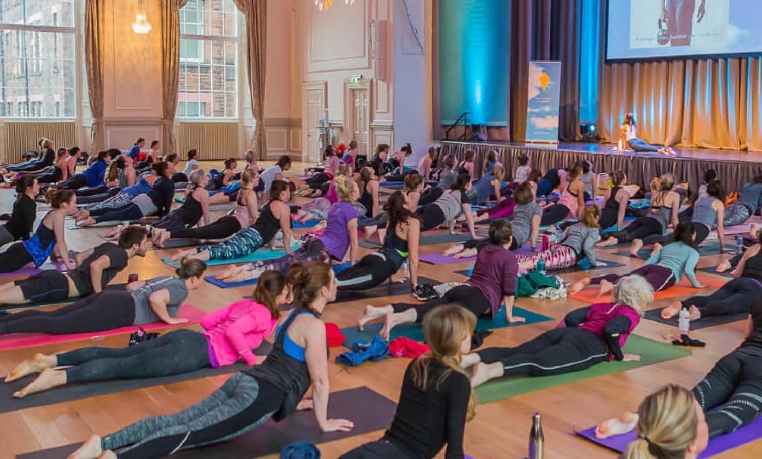 Yoga Class at the Wellbeing Festival in the Music Hall at the Assembly Rooms.