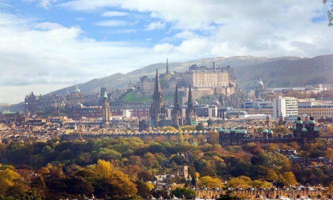 View of taken from the North-West of the city, including landmarks such as St Mary's Cathedral, Edinburgh Castle and Arthurs Seat.