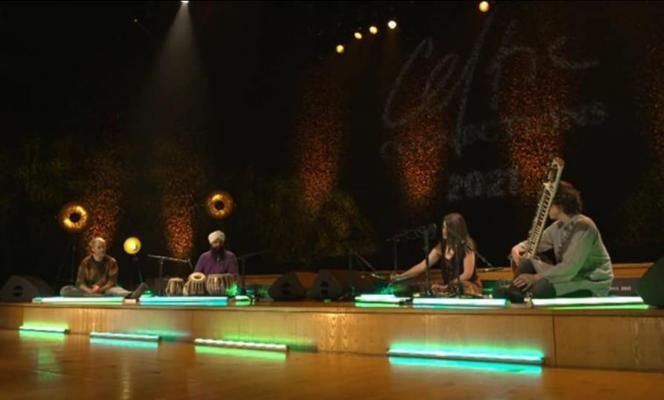 Four musicians from the Cosmic Shruti Box playing on stage at Celtic Connections 2021